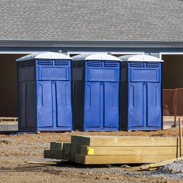 what is the cost difference between standard and deluxe porta potty rentals in Pennington